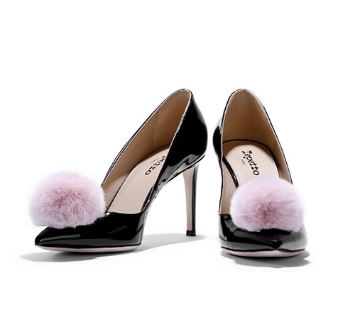 Leather pumps with fur pom-poms from Repetto